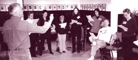 Choir practice. Lyle Eide (left), Henry Zacharias (seated).